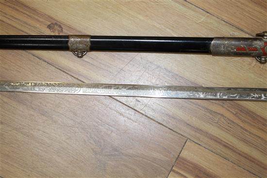 Three assorted Masonic swords, two of similar design with plumed helmet hilts and enamelled cross decoration, one inscribed In Hoc Sign